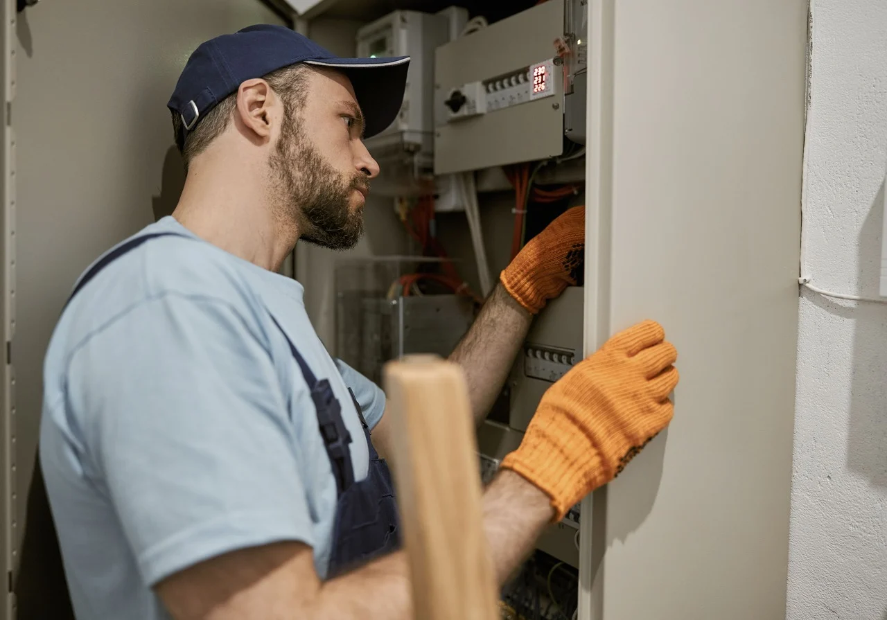 Electrician upgrading a electrical panel